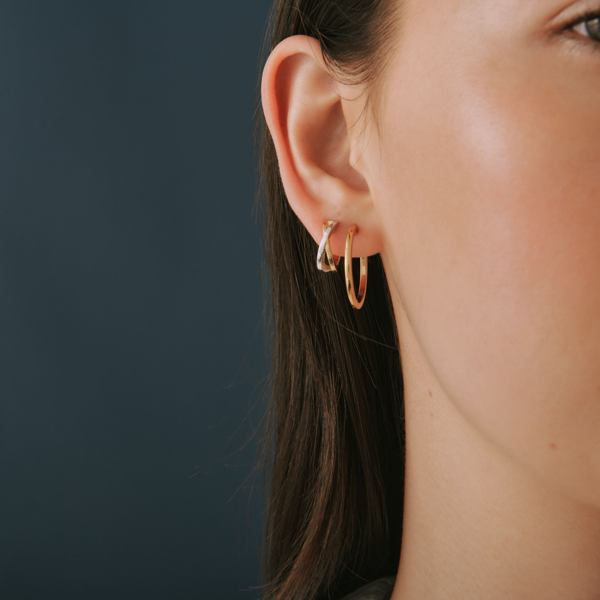 Two Tone Huggie Hoop Earrings main image 0