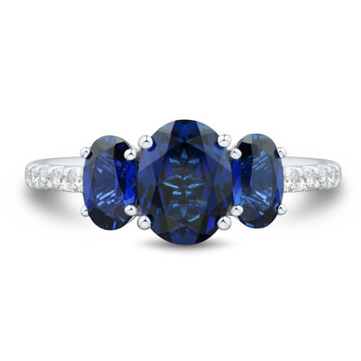 Lab-Created Blue Sapphire and Lab Grown Diamond Three-Stone Ring in 10K White Gold (1/5 ct. tw.)