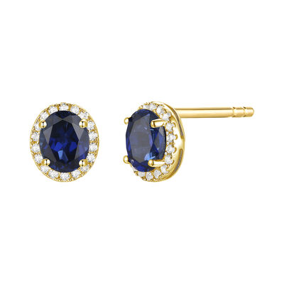 Oval-Shaped Blue Sapphire & Diamond Halo Stud Earrings in 14K Yellow Gold (1/10 ct. tw.)