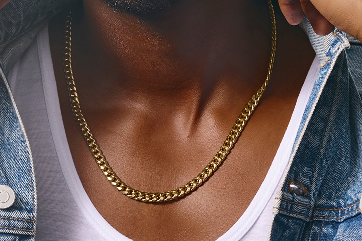 A rose gold round solitaire engagement ring