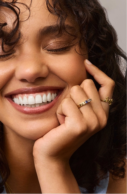 Two personalized engraved pendants in white gold