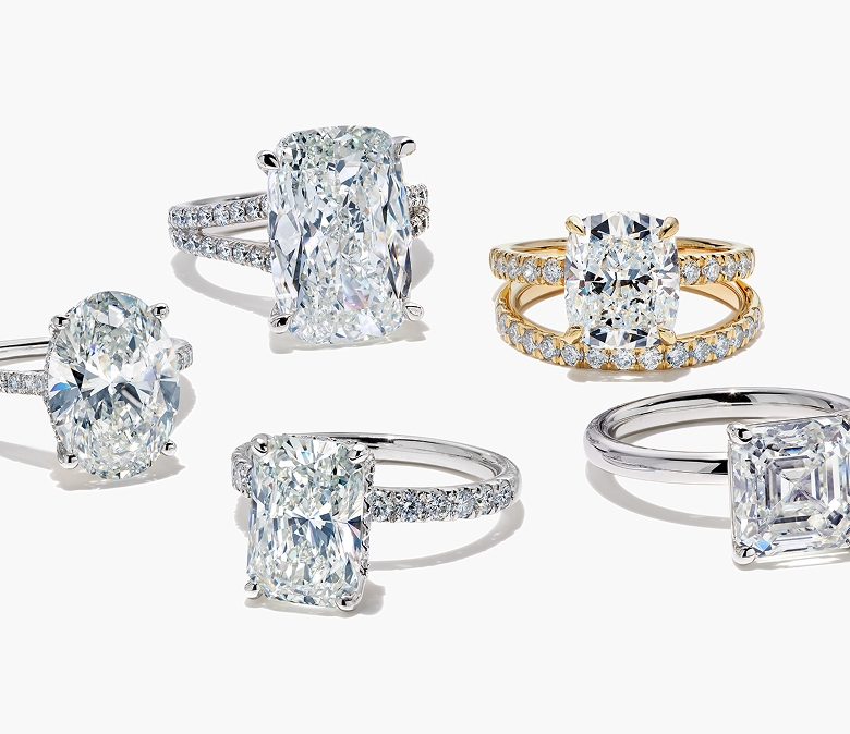 5 diamond engagement rings on a white background