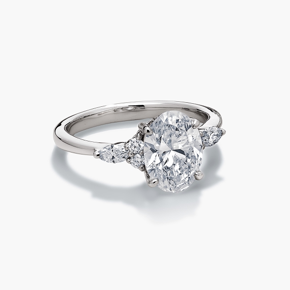 Side-stone engagement rings