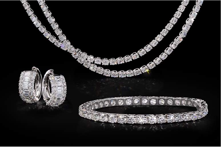 Diamond tennis necklace, diamond tennis bracelets and diamond hoop earrings