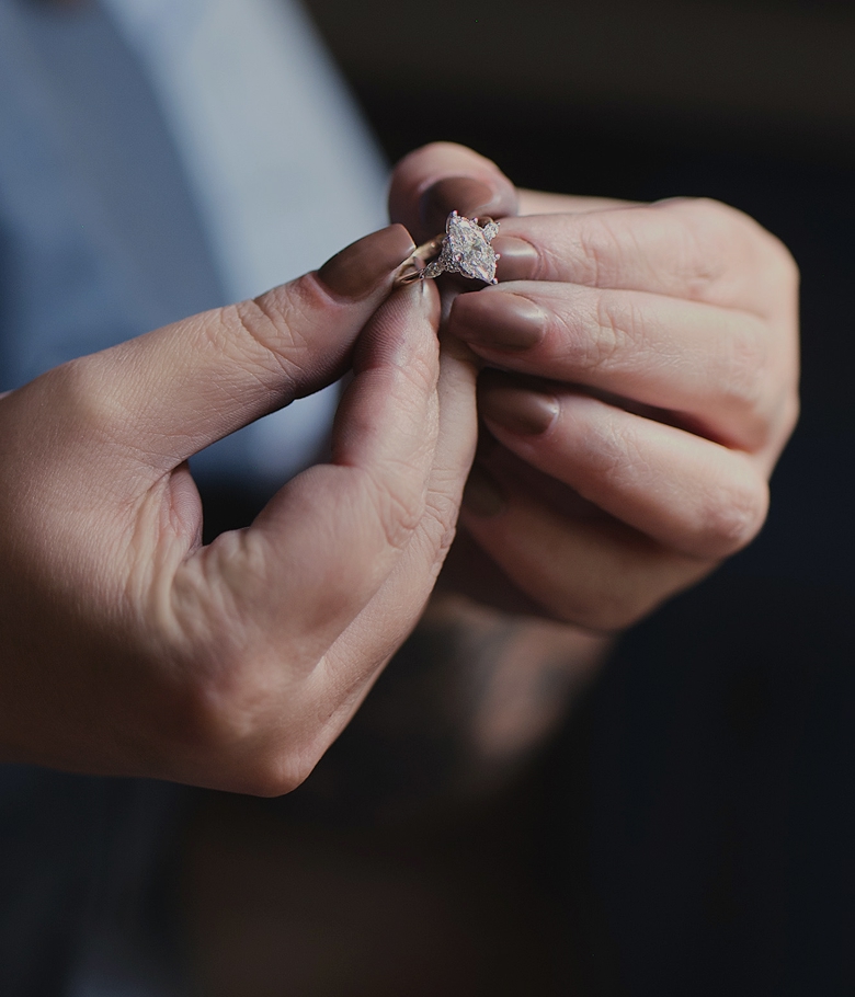 Image of ring being inspecting a ring. 
