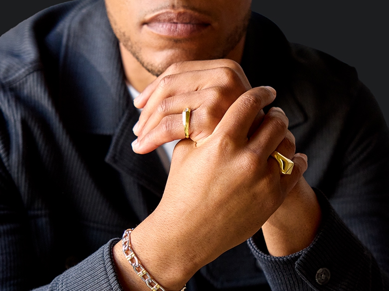 man wearing wilkes and forge rings and bracelet