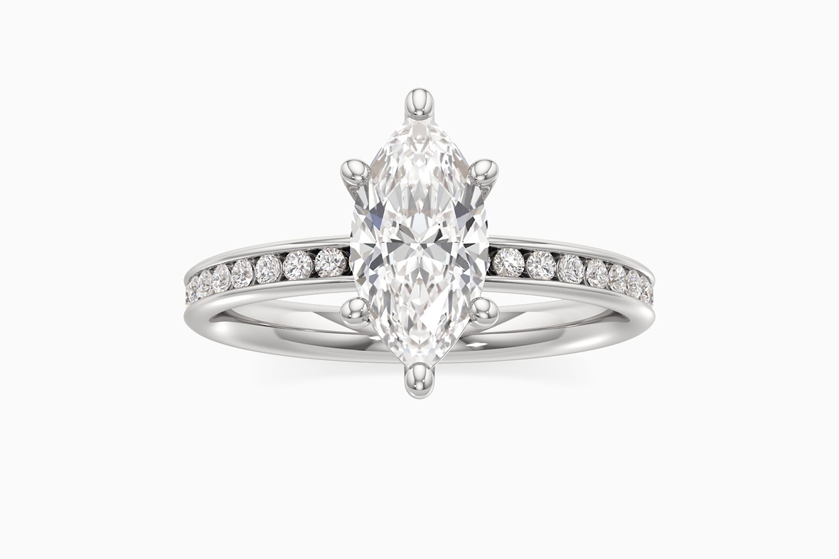 Image of an engagement ring with channel-set gemstones.