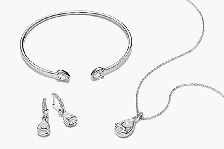 White sapphire bracelet, necklace, and earrings.