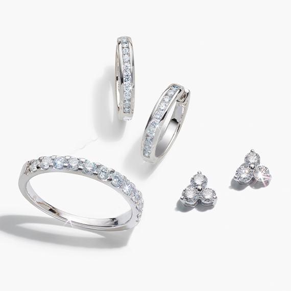 White gold diamond hoop earrings, diamond ring and diamond studs