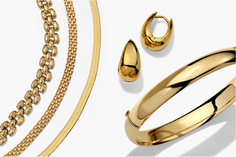 Three yellow gold chains, yellow gold hoops and yellow gold bangle